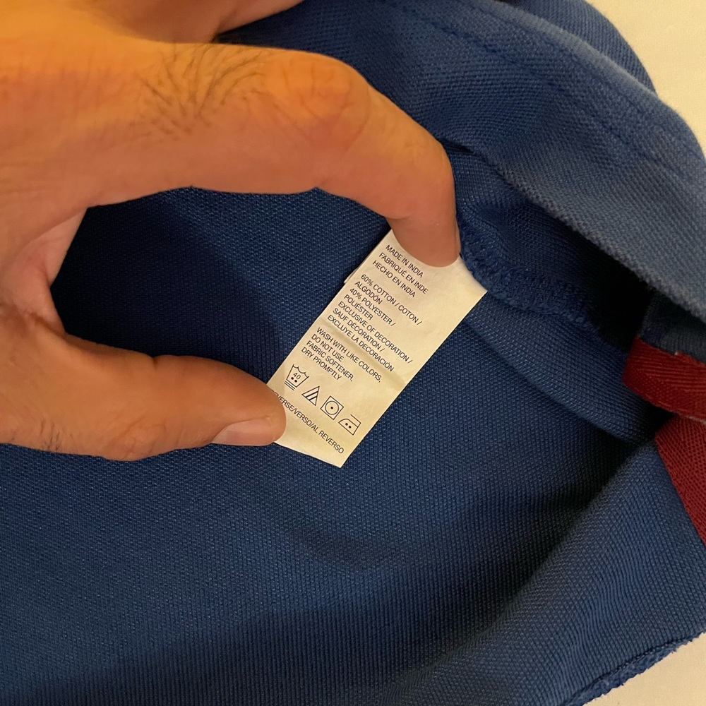 $14 OR 4 $14 items for $40 SALE
Izod Men's Polo Shirt in Blue with Red Accents - Picture 2 of 5
